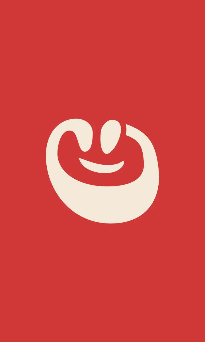 Symbole souriant The Picnic Club crème sur fond rouge.
