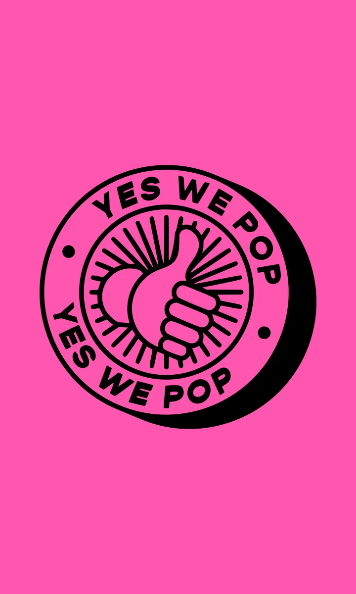 Sticker « Yes we pop » noir sur fond rose.