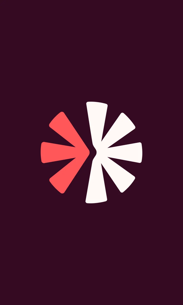Symbole Régis corail et crème sur fond prune.